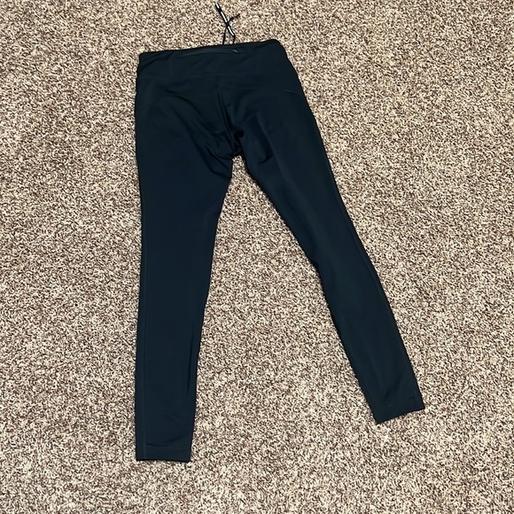 Nike Dri Fit size small black leggings. EUC. zip back pocket, mesh calf detail. - Picture 8 of 11